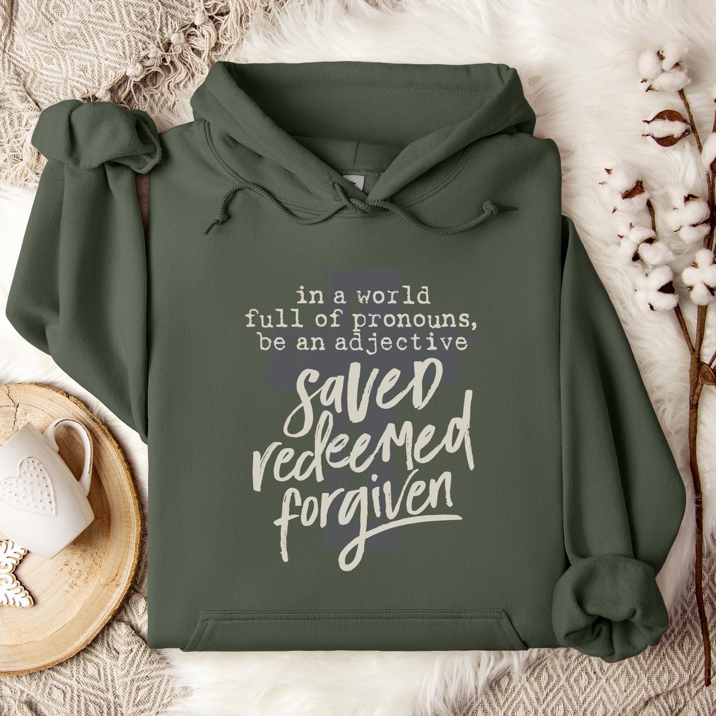 In A World Full Of Pronouns Be An Adjective Saved Redeemed Forgiven Hoodie