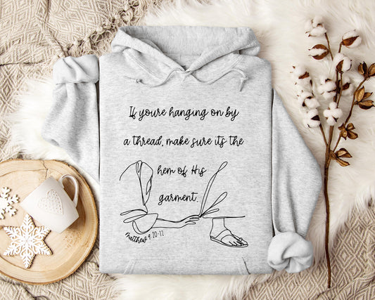 If You're Hanging On By A Thred Make Sure It's The Hem Of His Garment Matthews 9.20-22 Hoodie