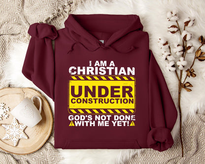 I'm A Christian God's Not Done With Me Yet Hoodie