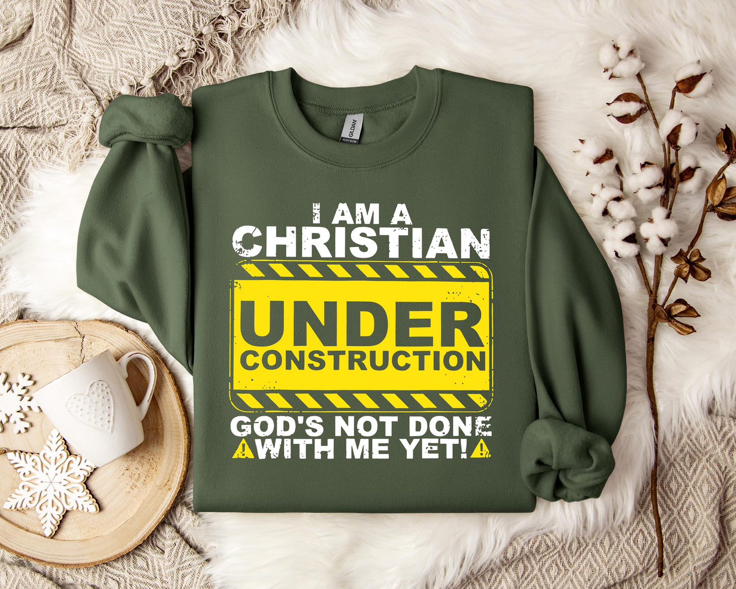 I'm A Christian God's Not Done With Me Yet Sweatshirt