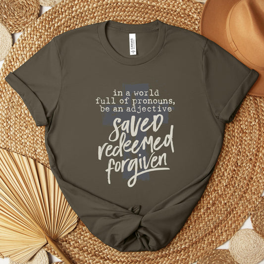 In A World Full Of Pronouns Be An Adjective Saved Redeemed Forgiven Premium T-shirt