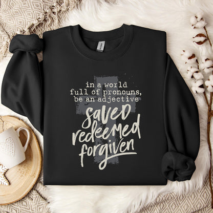In A World Full Of Pronouns Be An Adjective Saved Redeemed Forgiven Sweatshirt