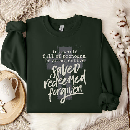 In A World Full Of Pronouns Be An Adjective Saved Redeemed Forgiven Sweatshirt