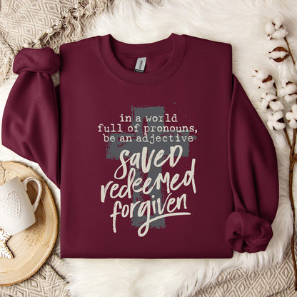 In A World Full Of Pronouns Be An Adjective Saved Redeemed Forgiven Sweatshirt