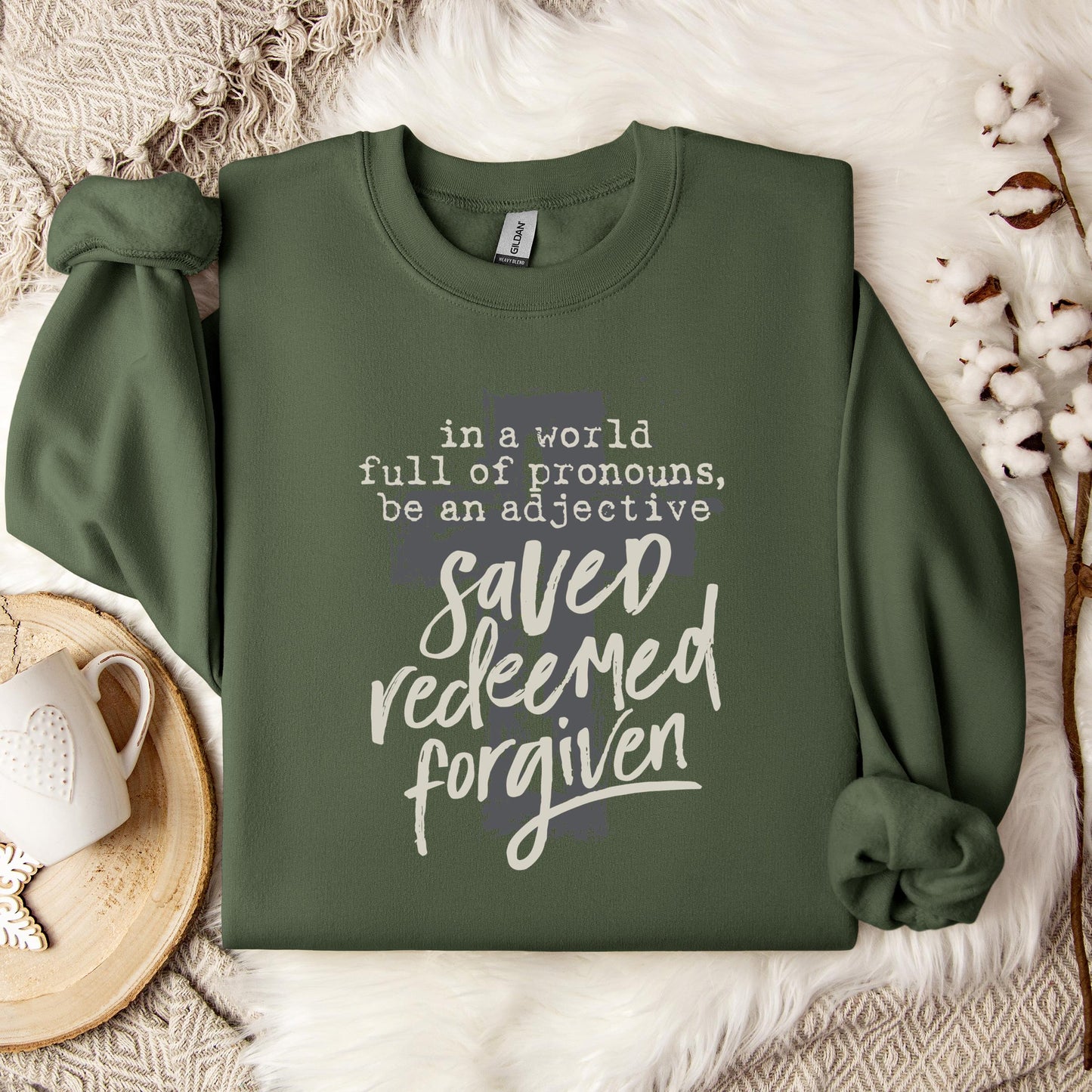 In A World Full Of Pronouns Be An Adjective Saved Redeemed Forgiven Sweatshirt