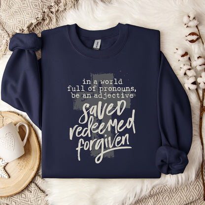 In A World Full Of Pronouns Be An Adjective Saved Redeemed Forgiven Sweatshirt