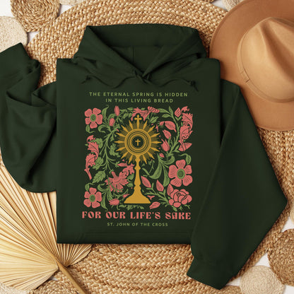 The eternal spring is hidden in this living bread For our life's sake 01
