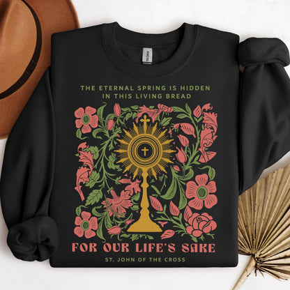 The eternal spring is hidden in this living bread For our life's sake 01