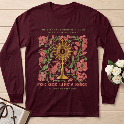 The eternal spring is hidden in this living bread For our life's sake 01