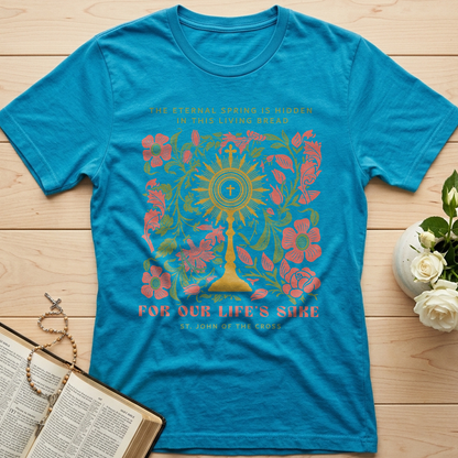 The eternal spring is hidden in this living bread For our life's sake 01