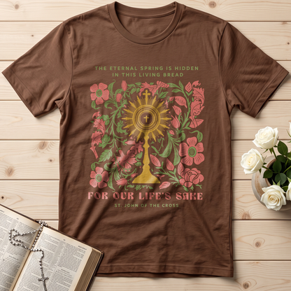 The eternal spring is hidden in this living bread For our life's sake 01